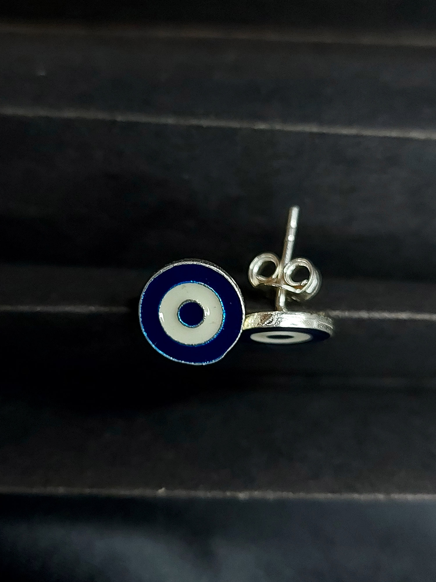 Silver evil eye round earring