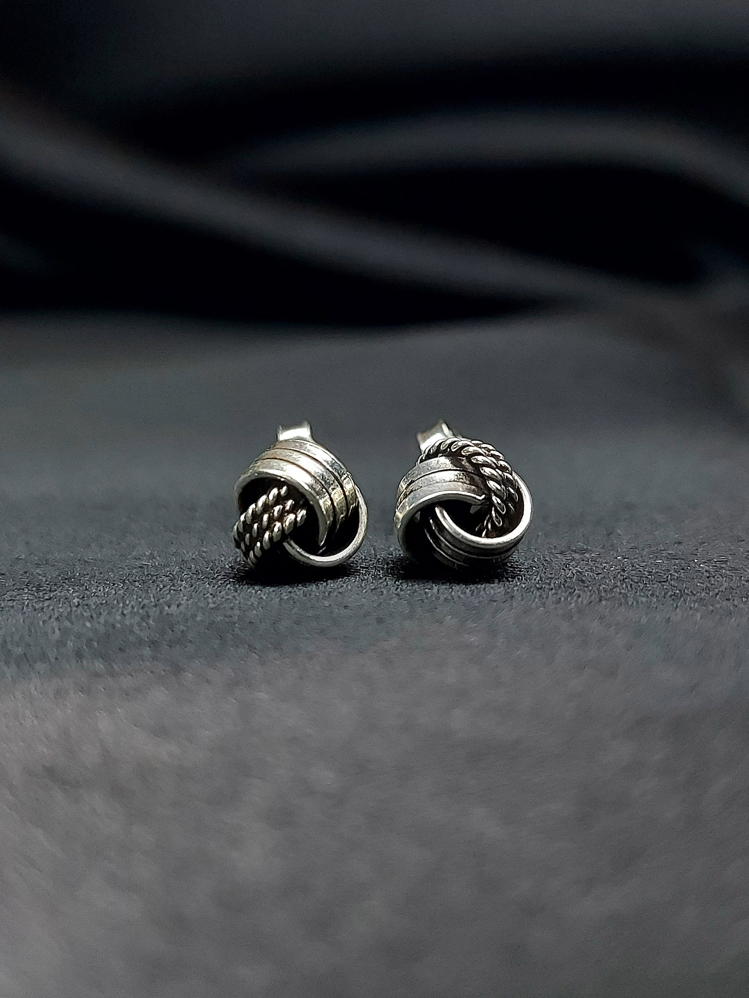 Silver oxidized rolled stud earring