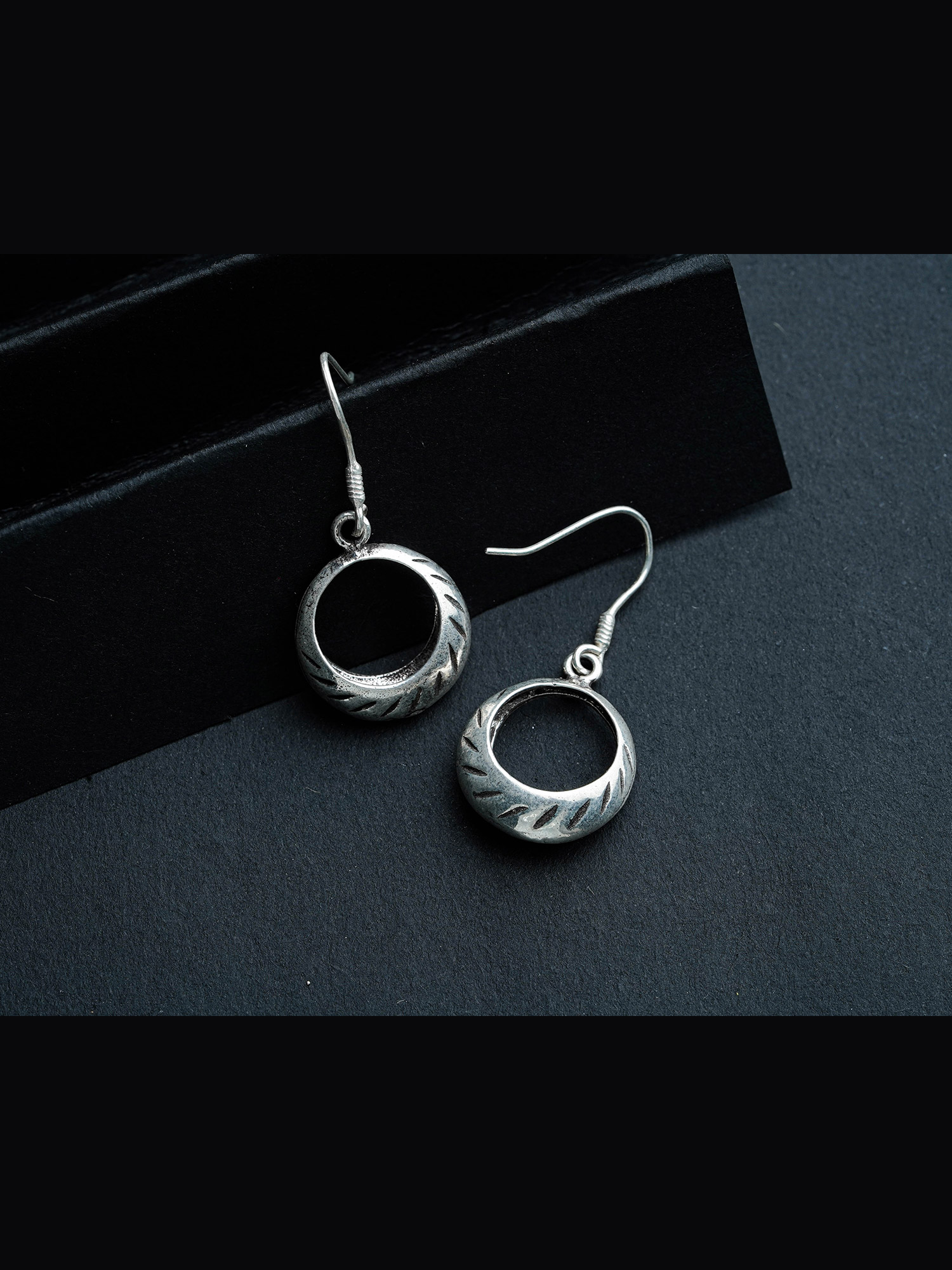 Silver basket earring