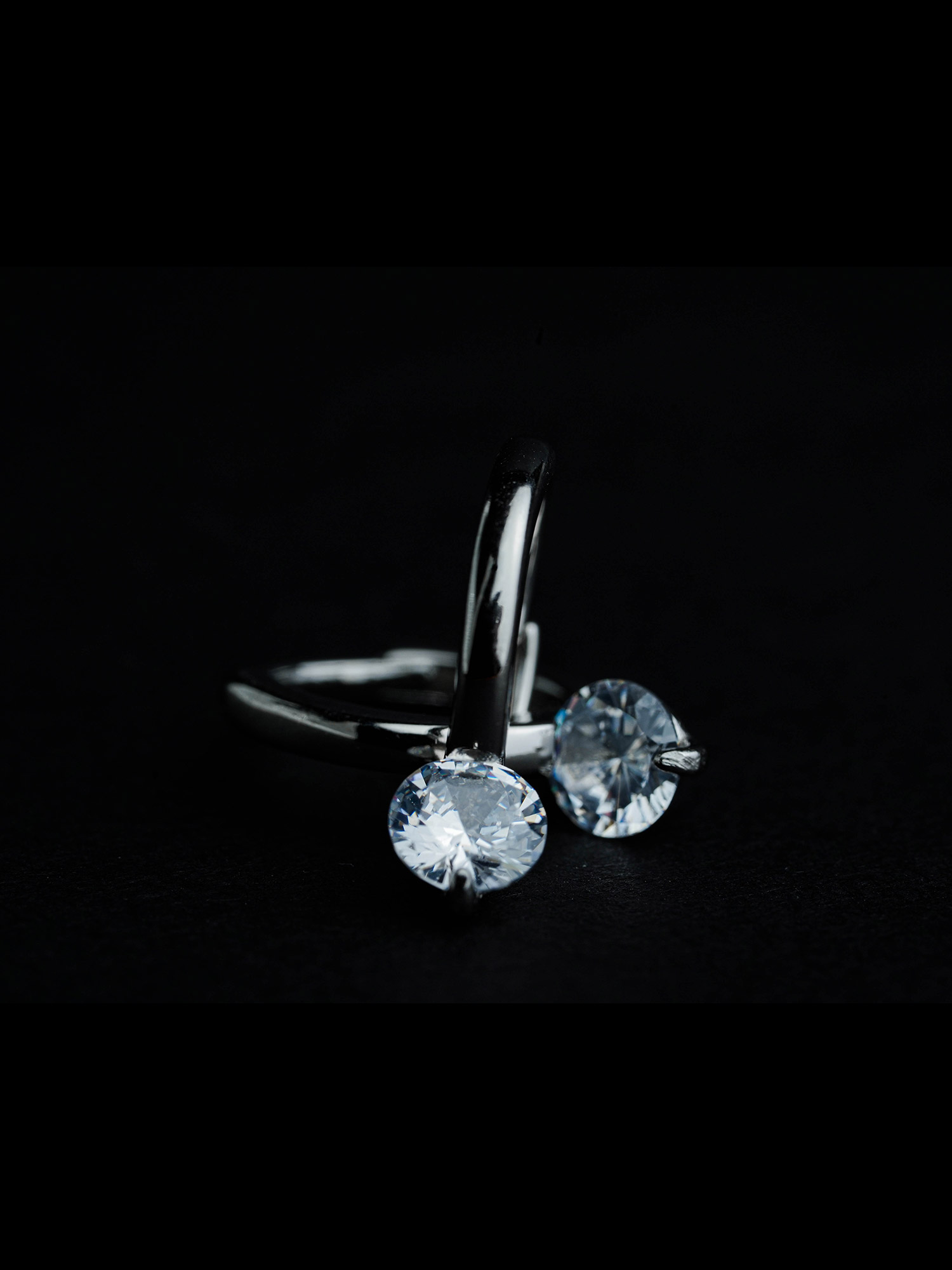 Silver solitaire earring