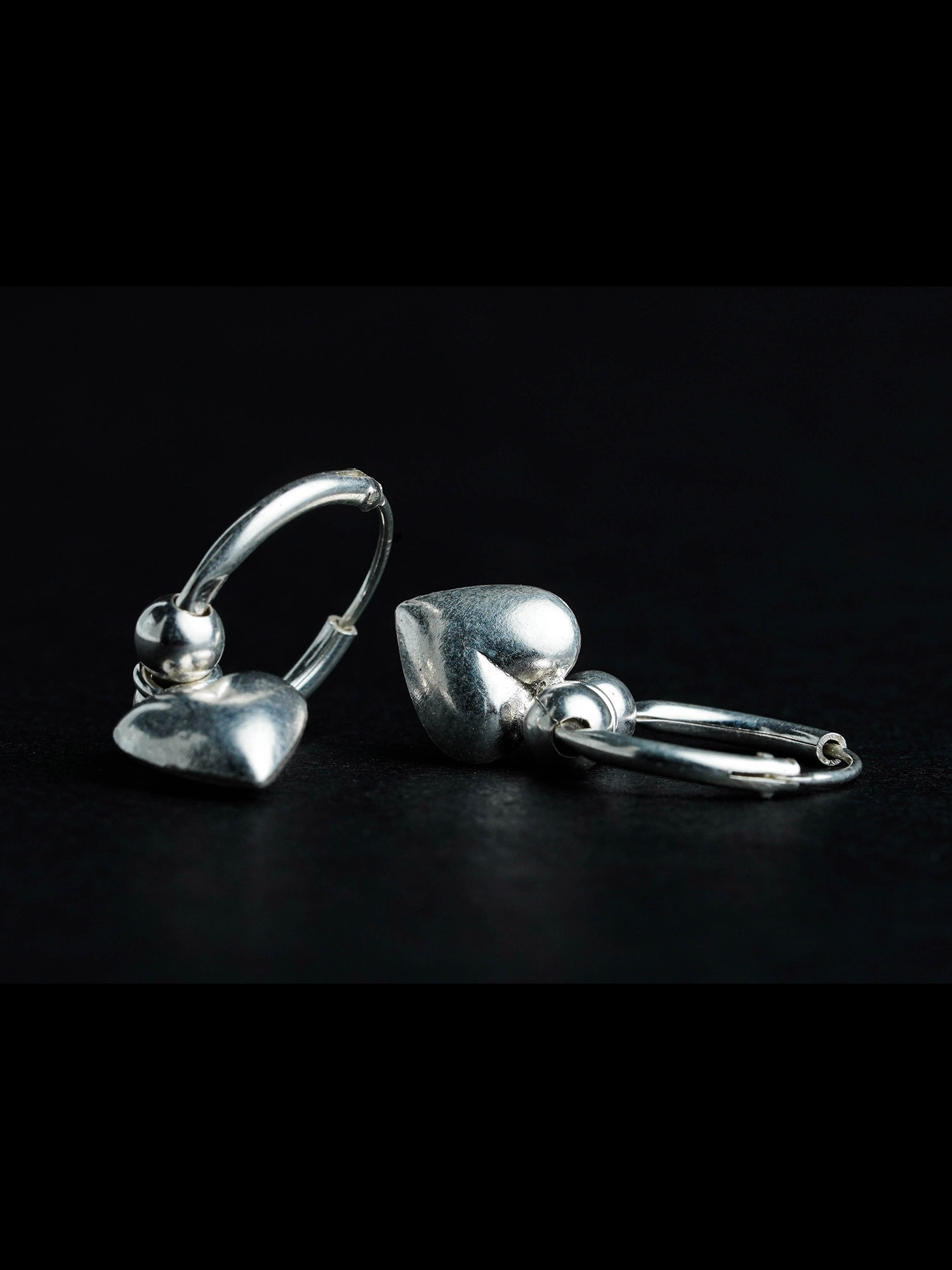 Silver hanging heart earring