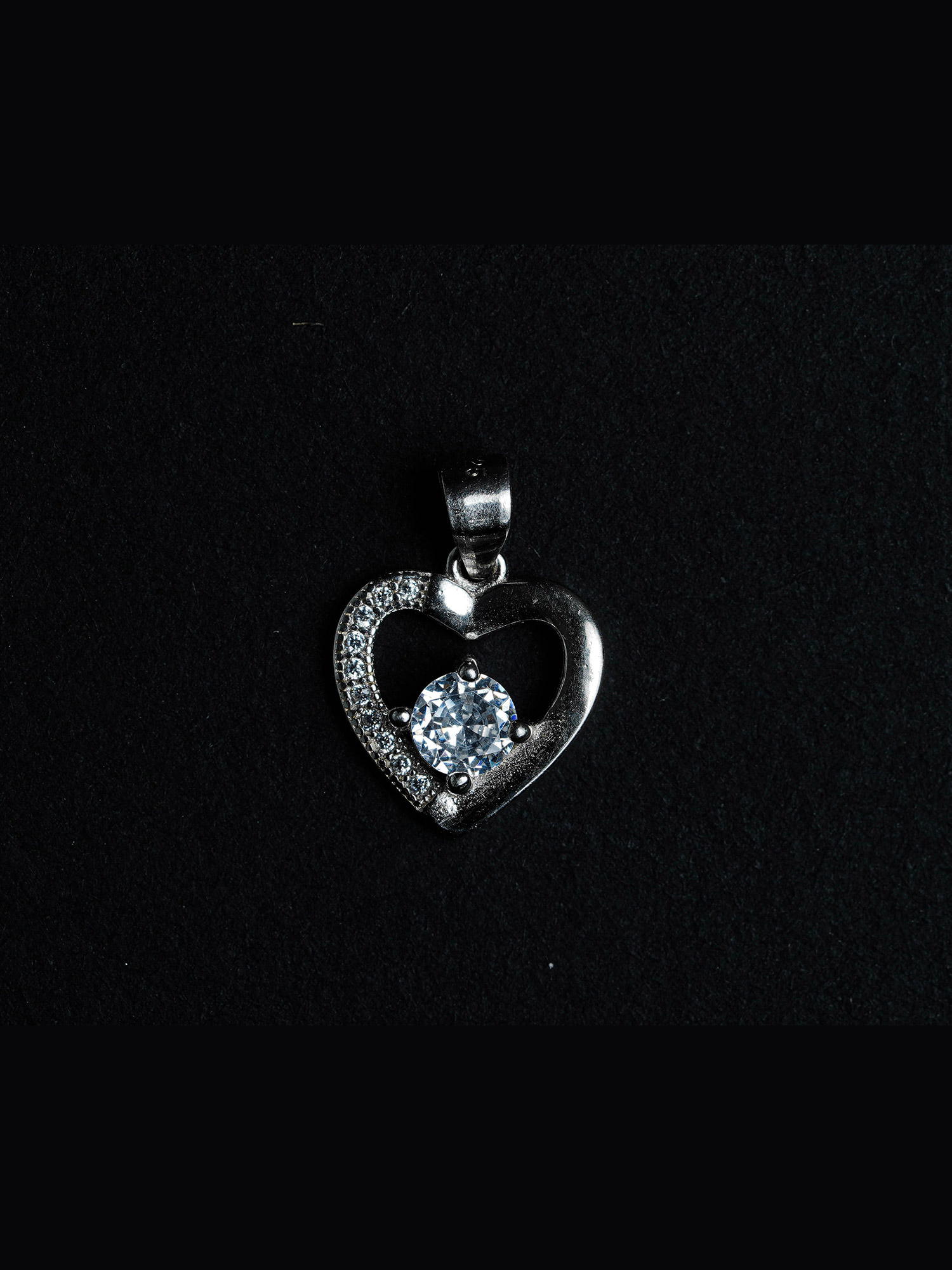 Silver solitaire diamond heart pendent