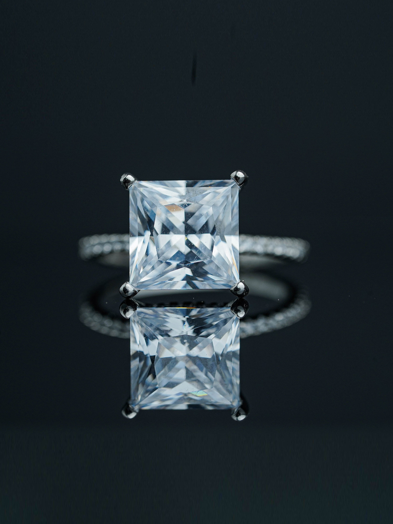 Silver solitaire ring